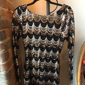 Tight gold black sequin dress with scallop detail